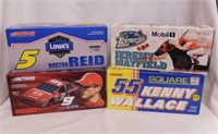 4 Nascar diecast race cars in boxes: Signed