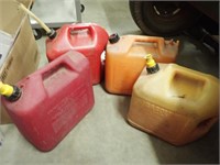 (3) Poly Gas Cans & (1) Diesel Can