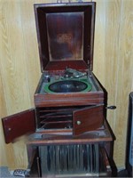 Victrola wind-up record player with cabinet