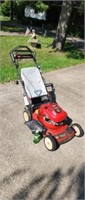 Toro 6.5 hp electric start push mower works good.