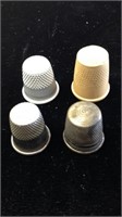 For sewing thimbles one Hallmark sterling silver