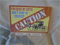 Metal CAUTION OAT POWERED Sign