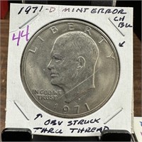 1971-D UNC IKE DOLLAR OBV STRUCK THRU