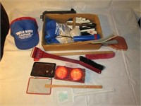 Box of Hats Flashlights and Fly swatters