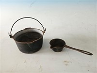 cast iron cup with spoon