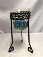 WROUGHT IRON CANDLE VESSEL HOLDER.  10 INCHES.