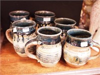 Six contemporary art pottery mugs by Behr