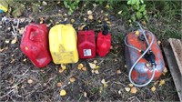 4 plastic fuel cans and boat fuel can