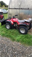 Honda Fourtrax 300 with plow