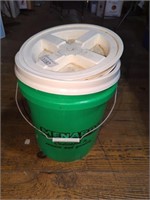 Menards bucket with lid with ice melt inside