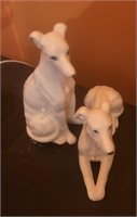 Two White Ceramic Dogs