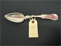 Coin silver serving spoon by William Poindexter