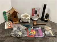 Box of miscellaneous items such as flashlights,