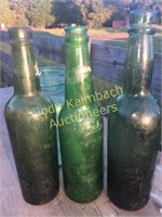 Emerald green embossed Muehlebachs beer bottle