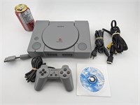 Console Playstation fonctionnelle avec jeu