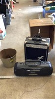 Boom box, guitar amplifier, metal bucket