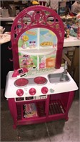 Kitchen playset with the sink and stove and more,