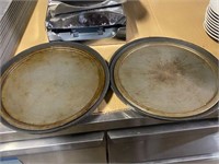 Set of round pizza pans, serving and baking