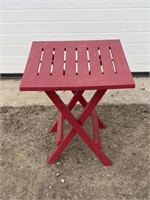 Small red folding patio table