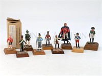 (9) LEAD SOLDIERS ON WOODEN STANDS