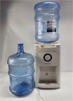 Water Dispenser Hot/Cold and 2 Empty 5 Gal Bottles