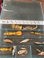 Assorted lot of fishing lures in plastic case