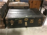 Black steamer trunk