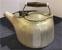 Vintage Griswold aluminum kettle with a wooden