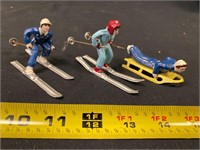 Vintage iron skier toys