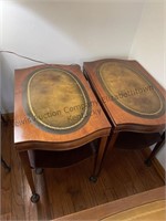 2 end tables on rollers measuring approximately