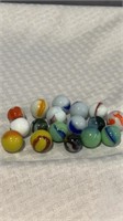 17 vintage shooter marbles.