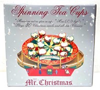 Mr. Christmas Spinning Tea Cups amusement ride ope