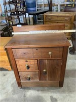 Vintage wood cabinet on rollers