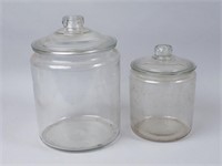 Pair of Large Clear Glass Lidded Jars