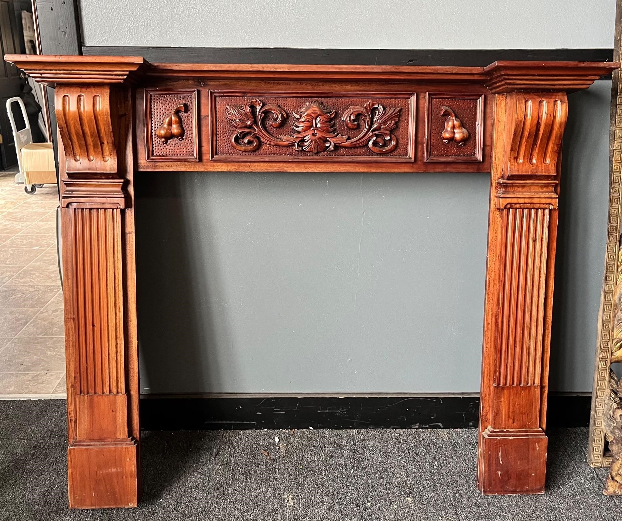 Antique face medallion wooden mantle