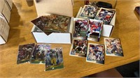 R 2 small boxes of football cards