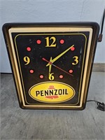 Vintage pennzoil lighted clock