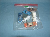 Bag lot of vintage die cast vehicles