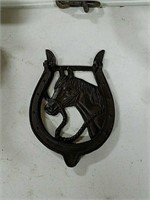 Cast horse door knocker