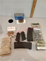 Various ammo, magazines,  grips