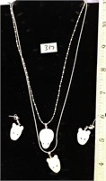 Two bear face pendants on sterling silver chains a