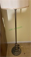 Brass-style metal floor lamp. Needs a new shade