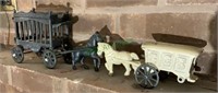 Two cast-iron wagons with horses - one complete -