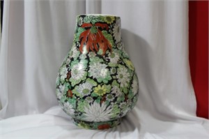 A Chinese Famille Noire Center Vase