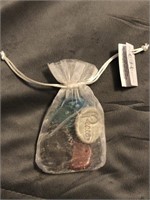 Bag of five pottery pieces with platitudes