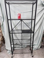 Folding  metal shelf on wheels.  59" H x 24" W .