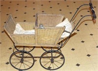 wicker doll carriage with wire wheels
