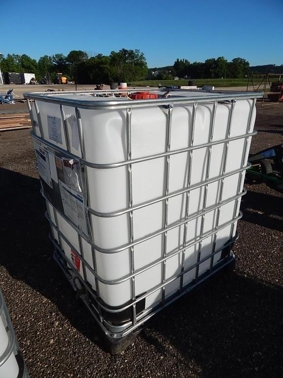 300 Gallon poly tank in a galvanized pallet cage;