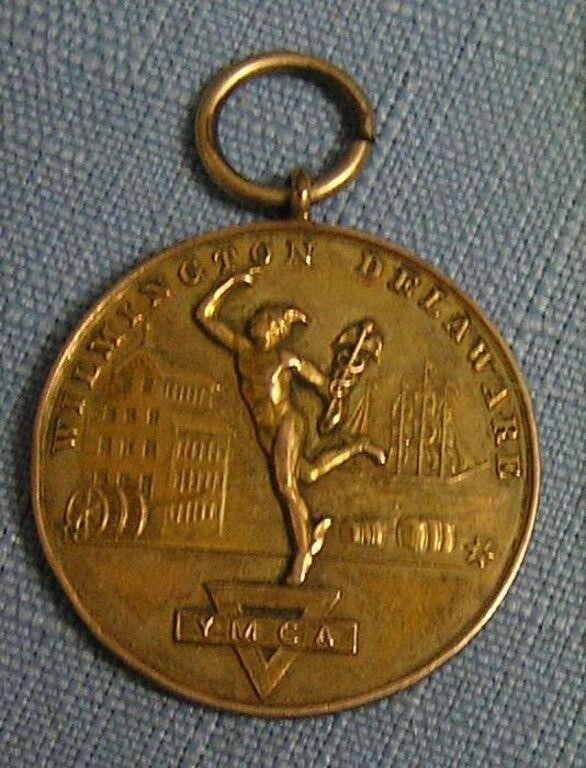 Early YMCA gold plated award medal