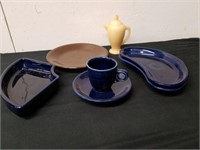 Miscellaneous Fiesta dishes with a candle